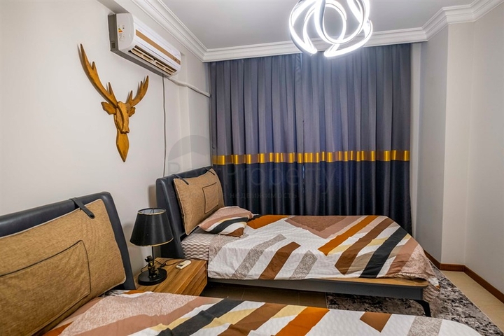 Квартира 2+1 на первой линии в районе Махмутлар