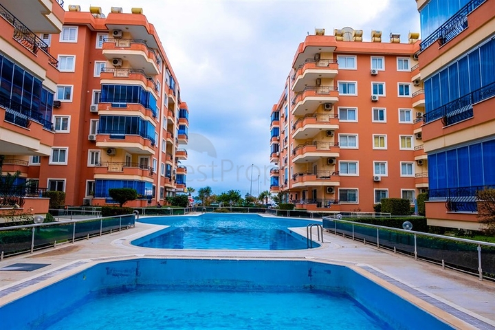 Квартира 2+1 на первой линии в районе Махмутлар