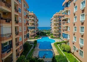 Квартира 2+1 на первой линии в районе Махмутлар