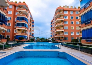 Квартира 2+1 на первой линии в районе Махмутлар