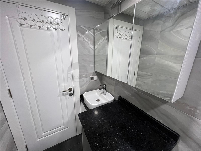 Новая стильная квартира планировкой 1+1 а районе Махмутлар