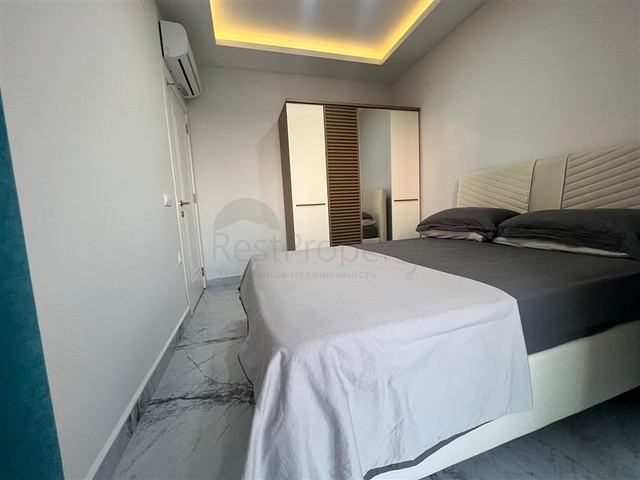 Новая стильная квартира планировкой 1+1 а районе Махмутлар