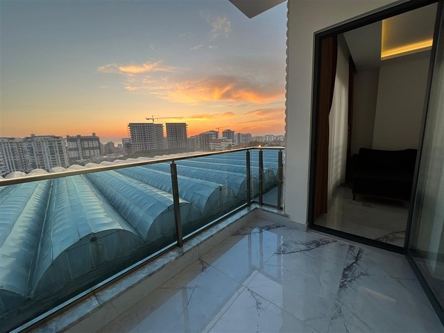 Новая стильная квартира планировкой 1+1 а районе Махмутлар