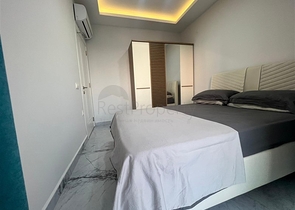 Новая стильная квартира планировкой 1+1 а районе Махмутлар