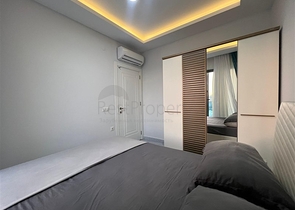 Новая стильная квартира планировкой 1+1 а районе Махмутлар