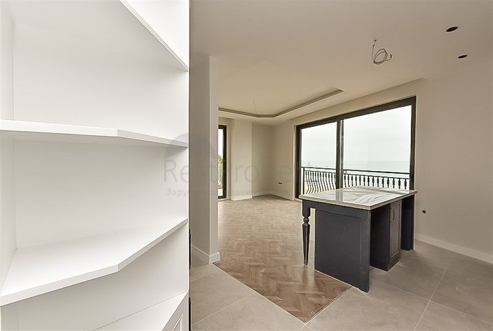 Двухкомнатная квартира в центре Алании с панорамным видом на море