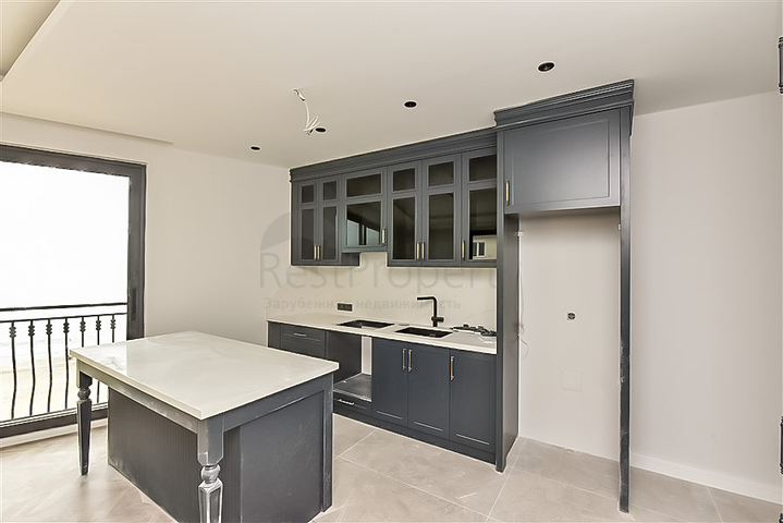 Двухкомнатная квартира в центре Алании с панорамным видом на море