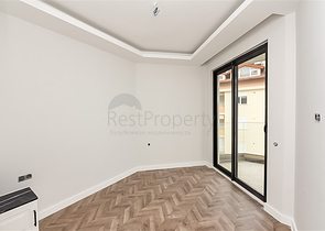 Двухкомнатная квартира в центре Алании с панорамным видом на море