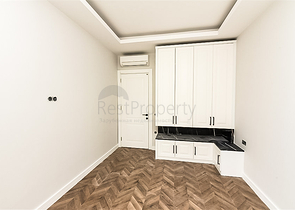 Двухкомнатная квартира в центре Алании с панорамным видом на море