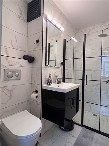 Квартира 2+1 в новом комплексе в районе Тедже в 400 метрах от моря