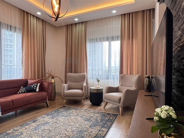 Квартира 2+1 в новом комплексе в районе Тедже в 400 метрах от моря