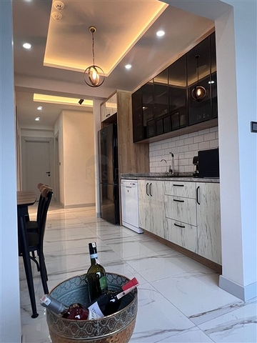 Квартира 2+1 в новом комплексе в районе Тедже в 400 метрах от моря