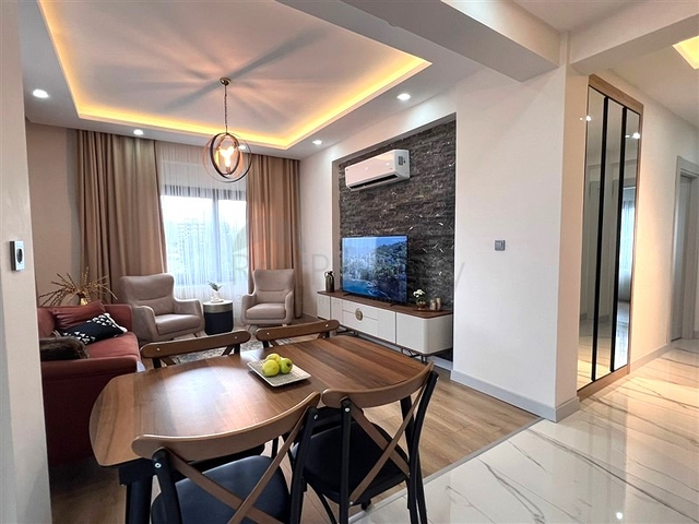 Квартира 2+1 в новом комплексе в районе Тедже в 400 метрах от моря