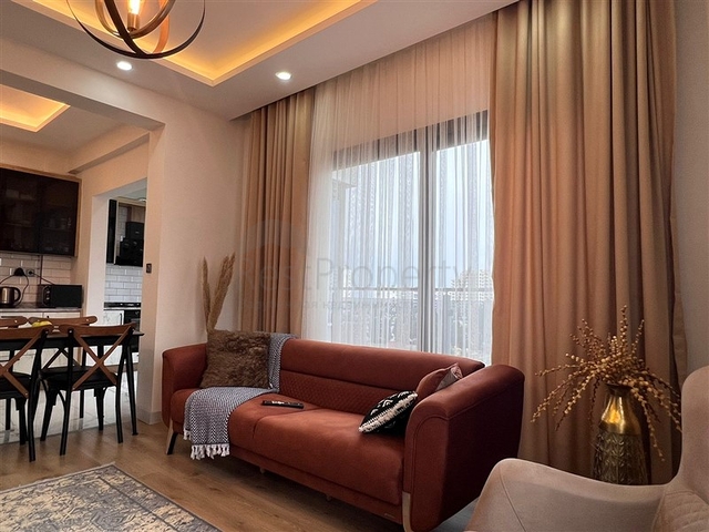 Квартира 2+1 в новом комплексе в районе Тедже в 400 метрах от моря