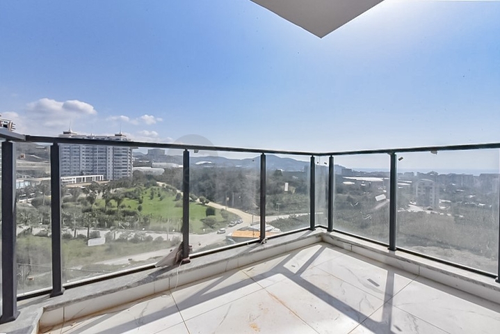 Квартира 1+1 с видом на горы и море в районе Махмутлар