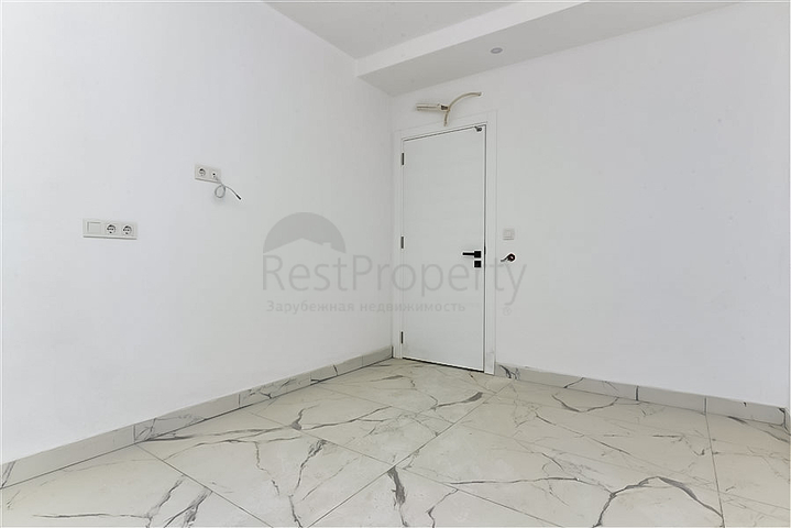 Квартира 1+1 с видом на горы и море в районе Махмутлар