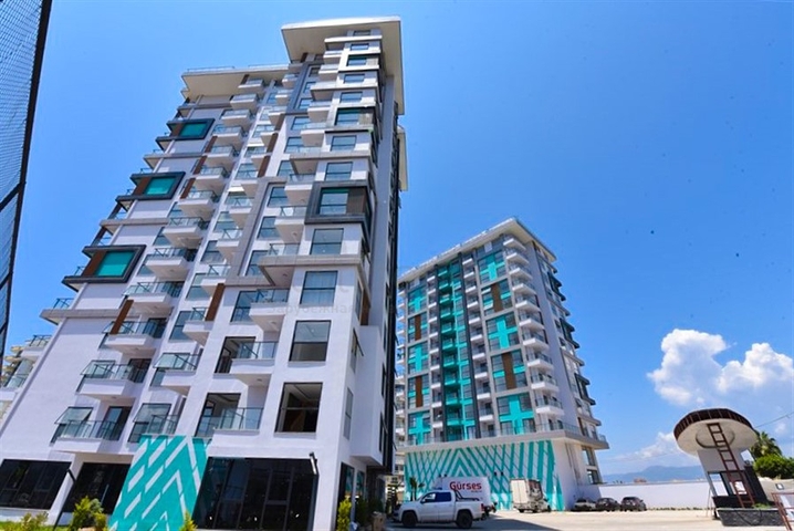 Квартира 1+1 с видом на горы и море в районе Махмутлар