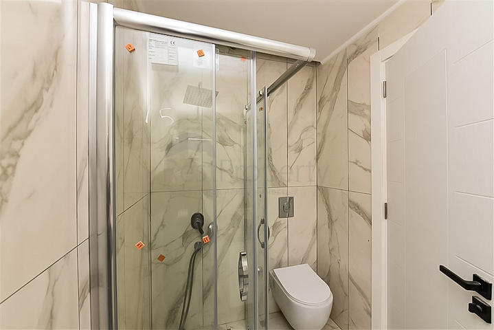 Квартира 1+1 с видом на горы и море в районе Махмутлар