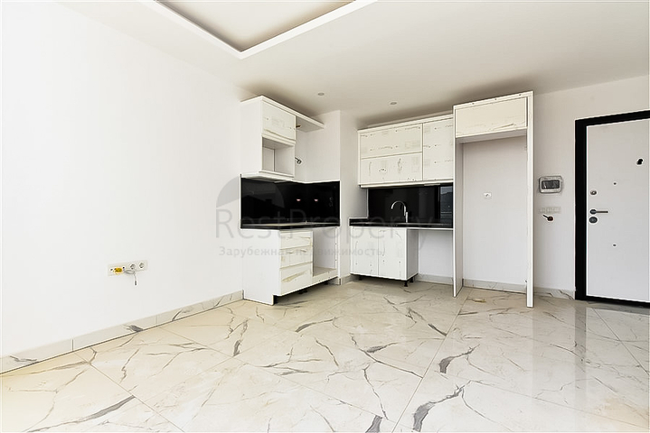 Квартира 1+1 с видом на горы и море в районе Махмутлар