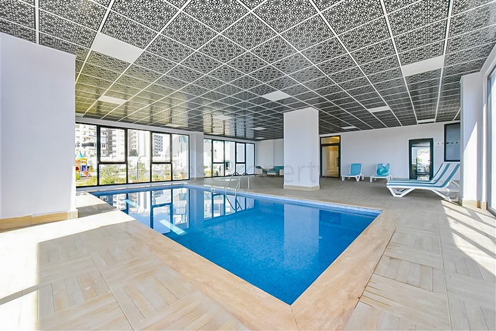 Квартира 1+1 с видом на горы и море в районе Махмутлар