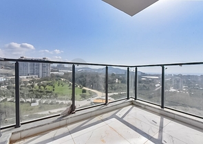 Квартира 1+1 с видом на горы и море в районе Махмутлар