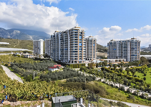 Квартира 1+1 с видом на горы и море в районе Махмутлар