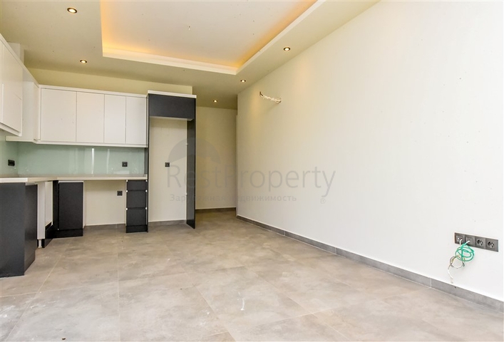 Квартира 1+1 с выходом в сад в районе Оба