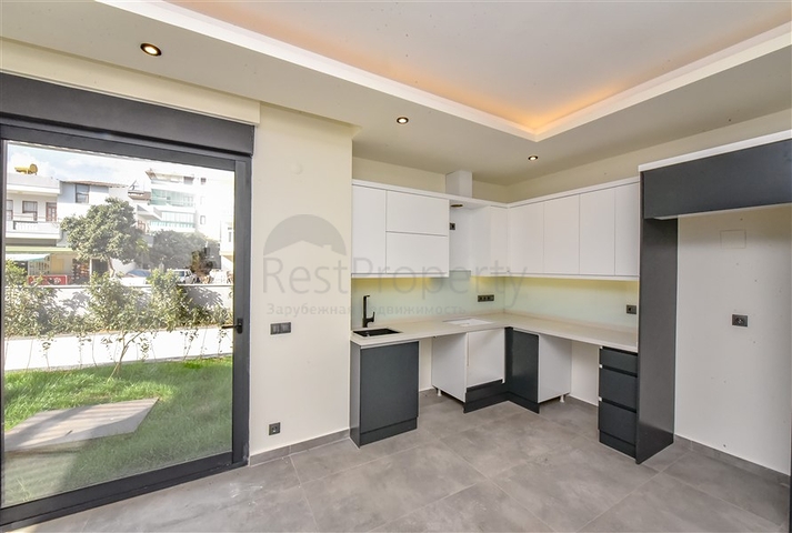 Квартира 1+1 с выходом в сад в районе Оба