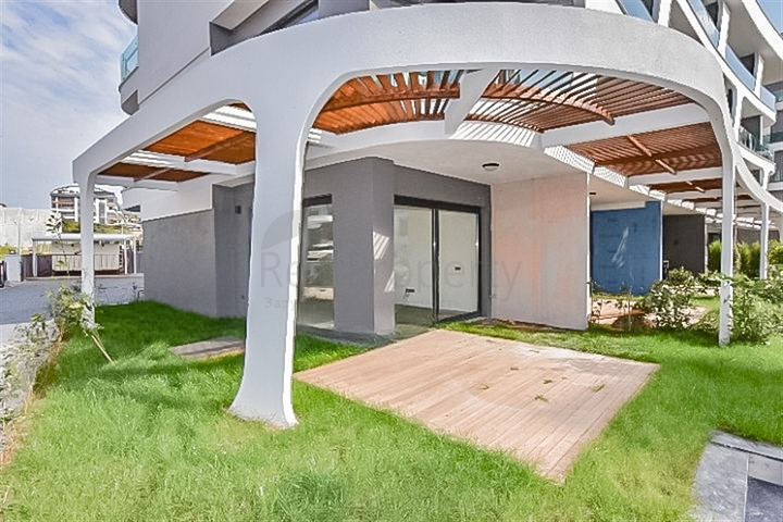 Квартира 1+1 с выходом в сад в районе Оба