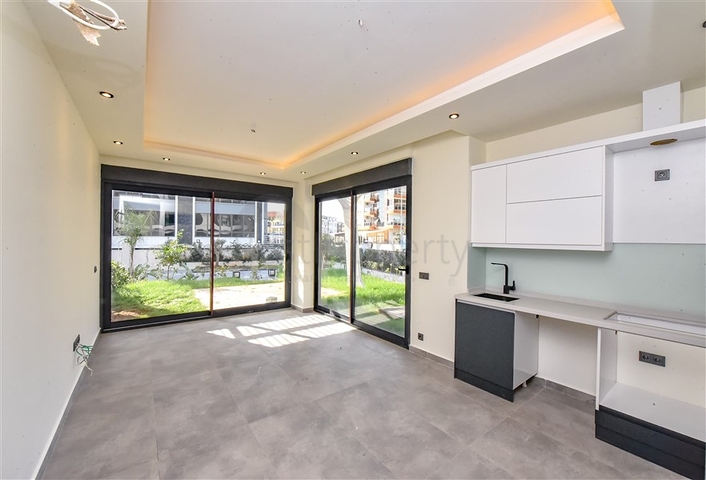 Квартира 1+1 с выходом в сад в районе Оба