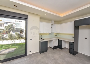 Квартира 1+1 с выходом в сад в районе Оба