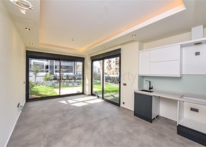 Квартира 1+1 с выходом в сад в районе Оба