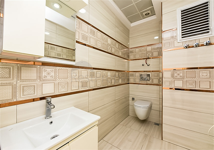 Садовый дуплекс 4+1 с отдельной кухней в центре Алании