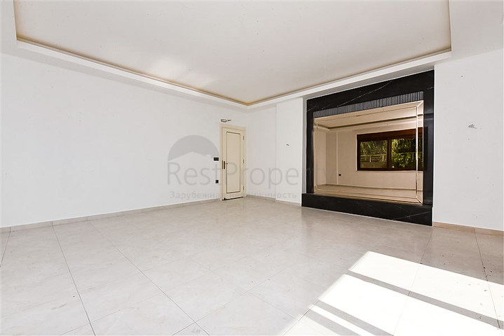 Садовый дуплекс 4+1 с отдельной кухней в центре Алании