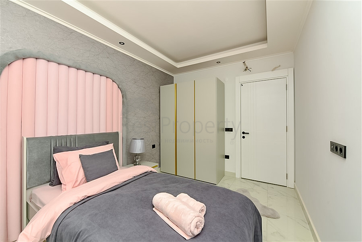 Уютный садовый дуплекс в районе Оба