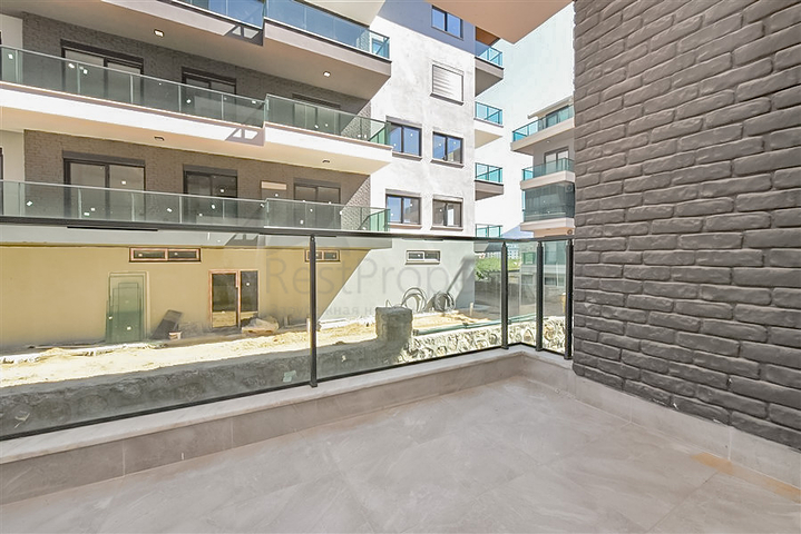 Уютный садовый дуплекс в районе Оба