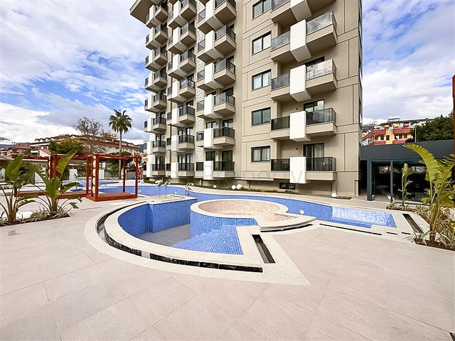 Квартира 1+1 в новом комплексе всего в 400 м от моря в центре Алании 