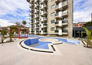 Квартира 1+1 в новом комплексе всего в 400 м от моря в центре Алании 