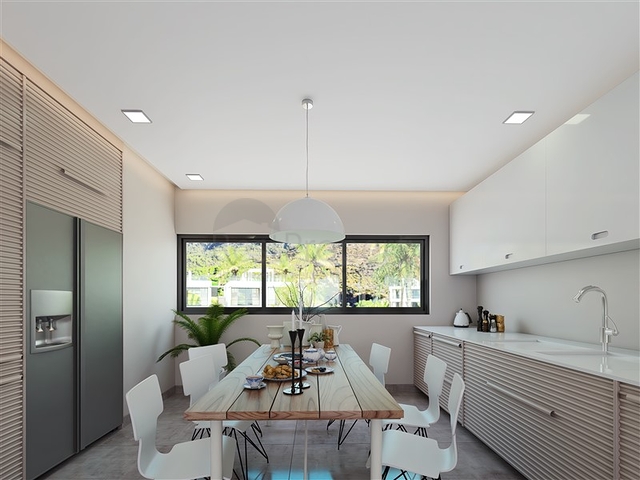 Апартаменты 2+1 со своей террасой  в 100 метрах от моря