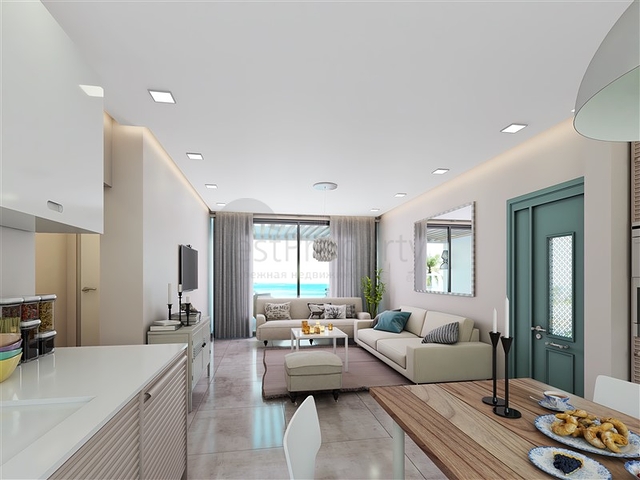 Апартаменты 2+1 со своей террасой  в 100 метрах от моря