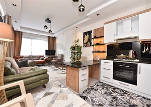 Меблированная двухкомнатная квартира в районе Махмутлар