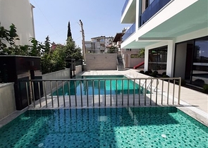 Меблированная двухкомнатная квартира в районе Махмутлар