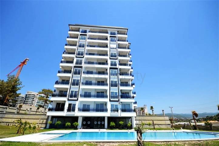 Меблированная двухкомнатная квартира планировки 1+1