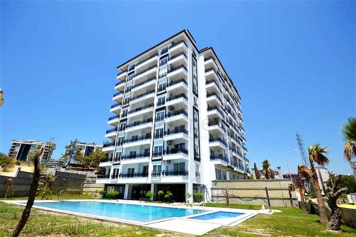 Меблированная двухкомнатная квартира планировки 1+1