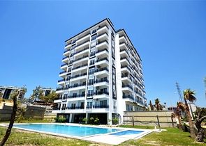 Меблированная двухкомнатная квартира планировки 1+1