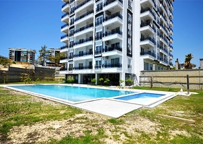 Меблированная двухкомнатная квартира планировки 1+1