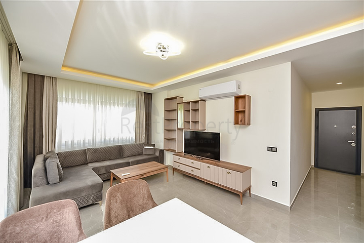 Трехкомнатная квартира в районе Махмутлар с видом на горы