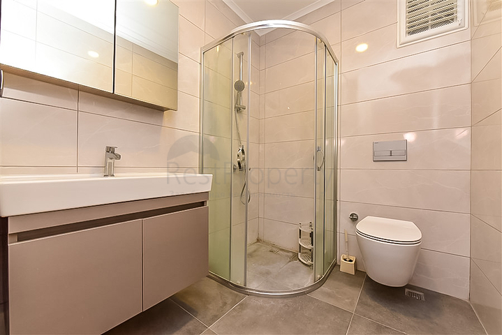 Трехкомнатная квартира в районе Махмутлар с видом на горы