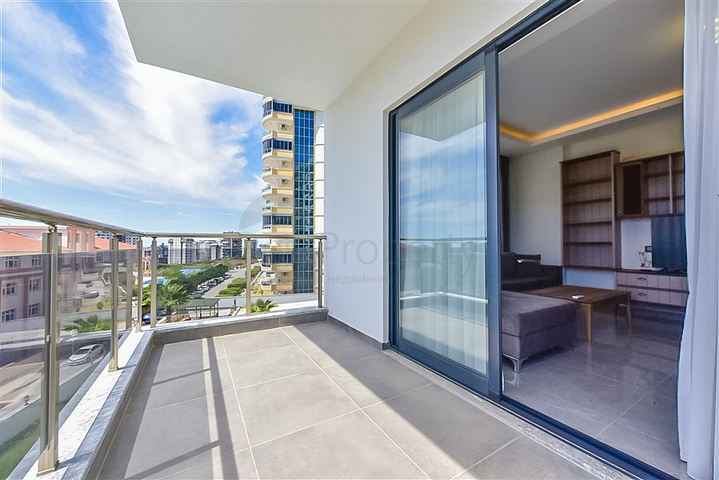 Трехкомнатная квартира в районе Махмутлар с видом на горы