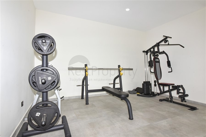 Трехкомнатная квартира в районе Махмутлар с видом на горы